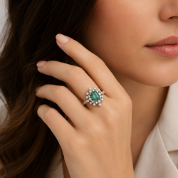 "Entourage" Ring in White Gold, Emerald, and Diamonds