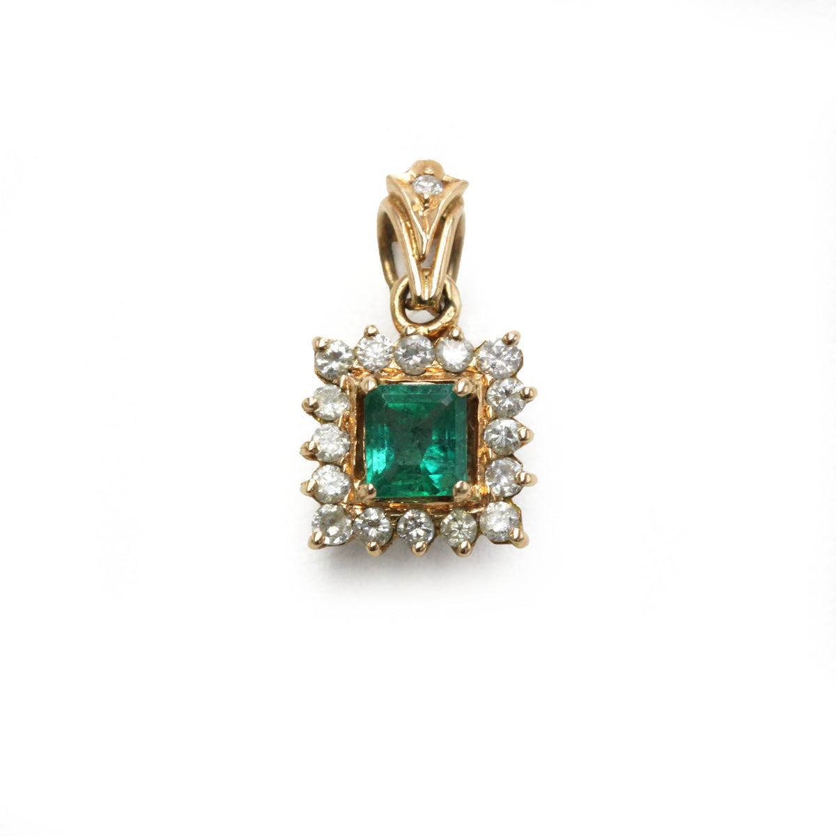 Pendentif en or jaune, émeraude et diamants