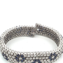 Flexible bracelet in white gold, sapphires, and diamonds