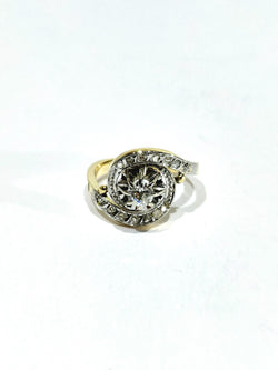 Tourbillon ring in yellow gold, white gold, and diamonds