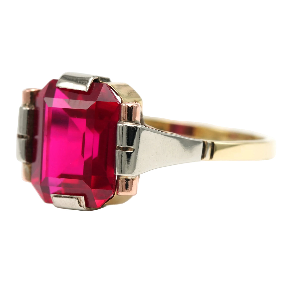 Solitaire Ring in White Gold, Yellow Gold, and Ruby
