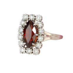 "Entourage" Ring in White Gold, Garnet, and Diamonds