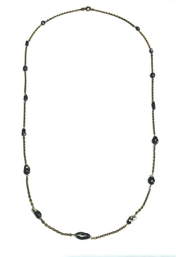 Rose gold long necklace with Tahitian pearls.