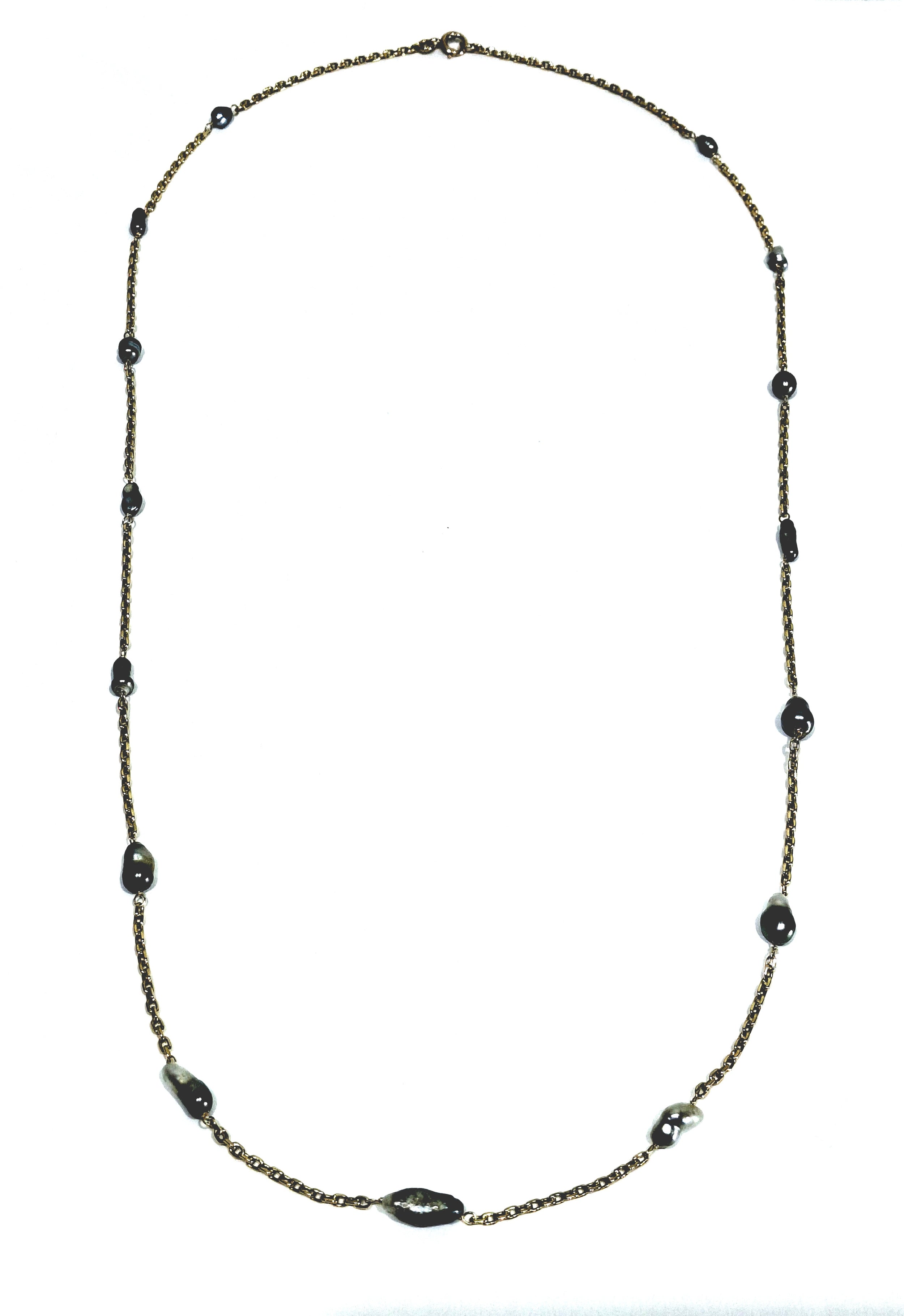 Rose gold long necklace with Tahitian pearls.