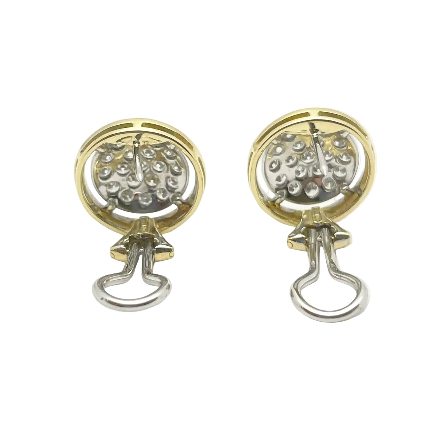Set in white gold, yellow gold and Diamonds