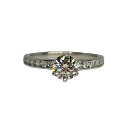 TIFFANY & CO. Solitaire Ring in Platinum and Diamonds