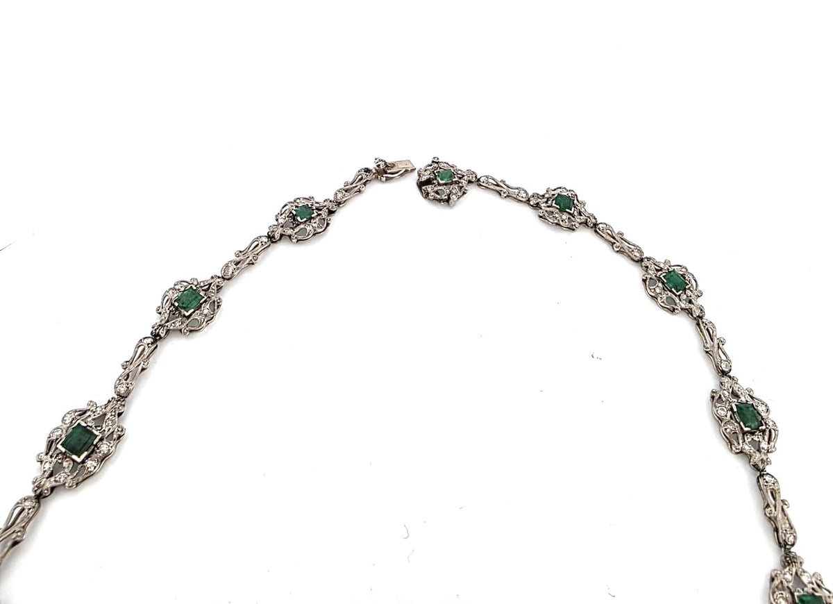 Plastron necklace in platinum, emeralds, and diamonds