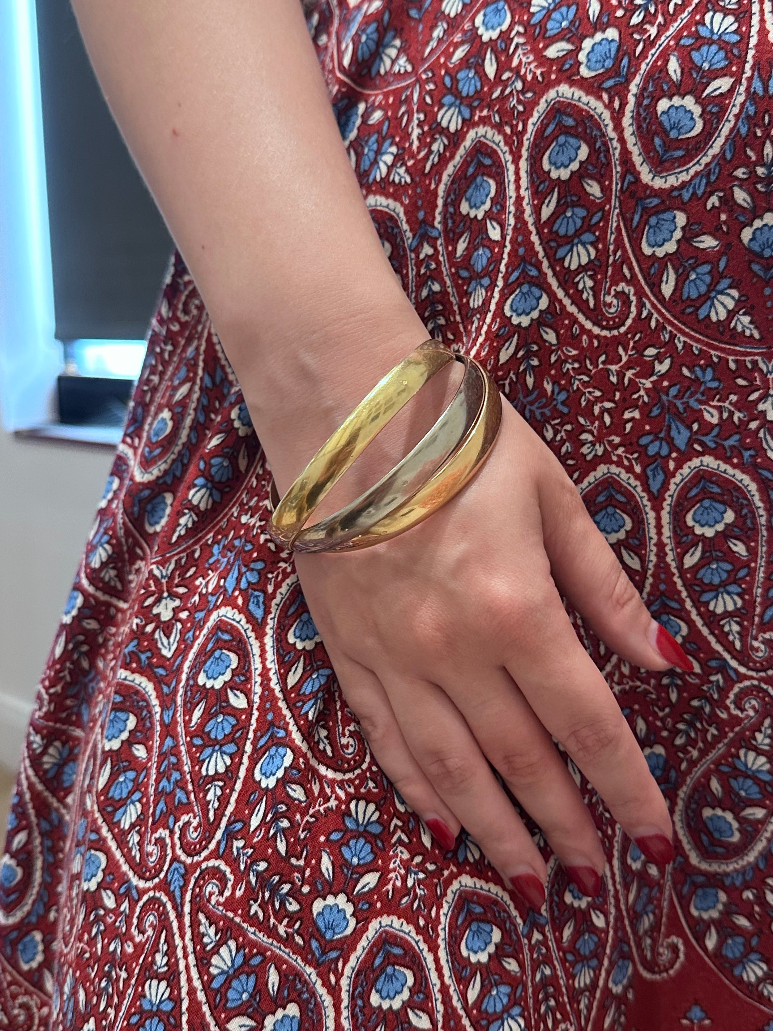Bangle in yellow gold, white gold, and rose gold