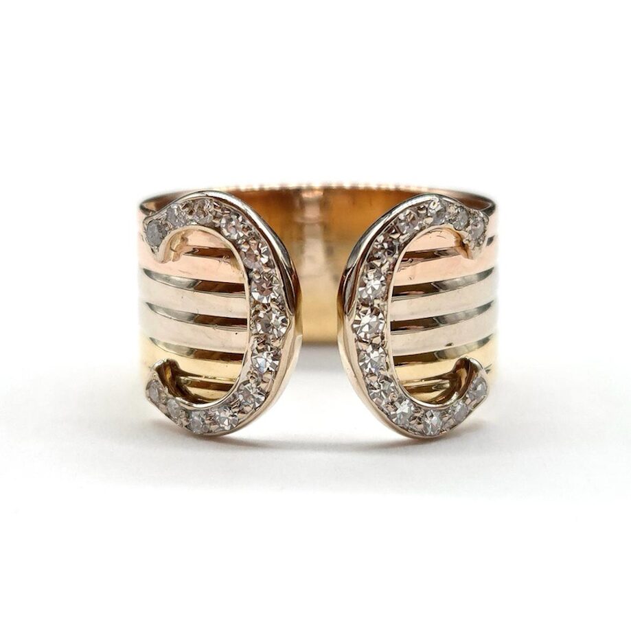 CARTIER "C de Cartier" Band Ring in white gold, yellow gold, rose gold, and diamonds