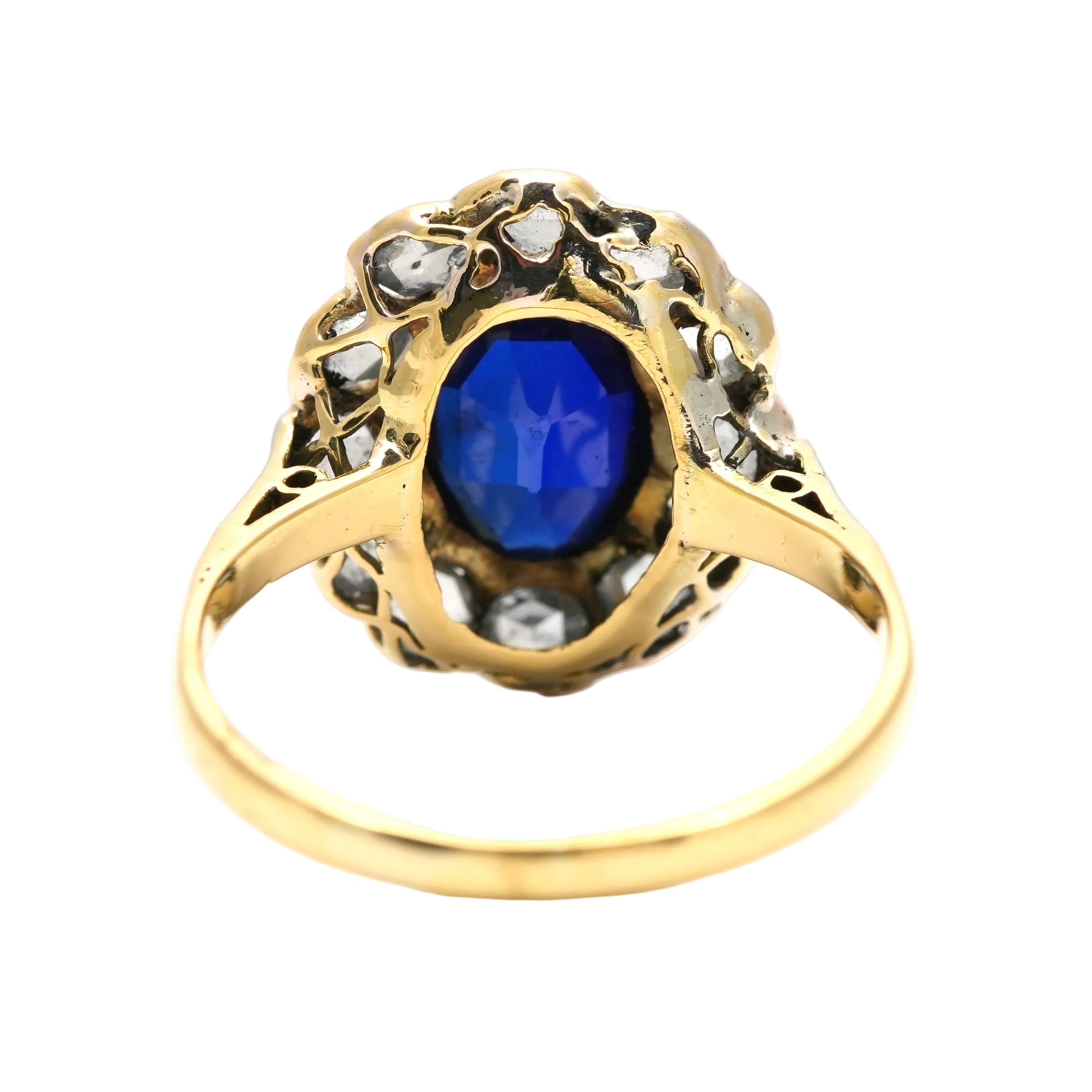 Entourage Ring in white gold, yellow gold, sapphire, and diamonds