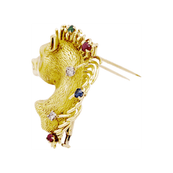 Broche "protomée de cheval", or jaune, diamants, rubis, saphir et émeraude.