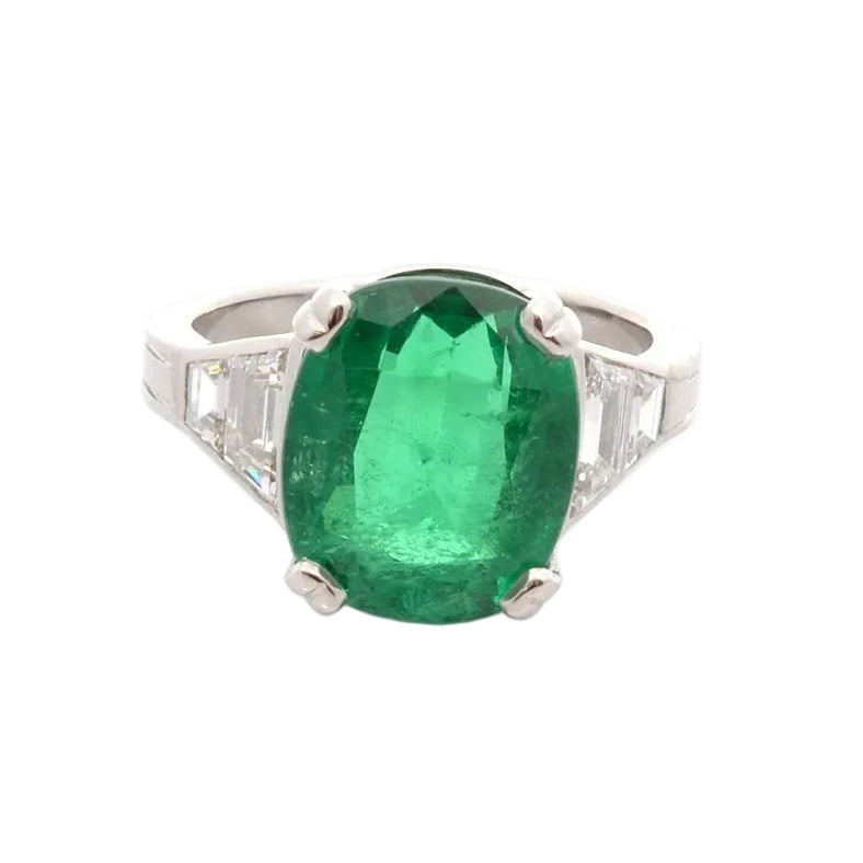 Ring emerald of 6.57cts and diamonds