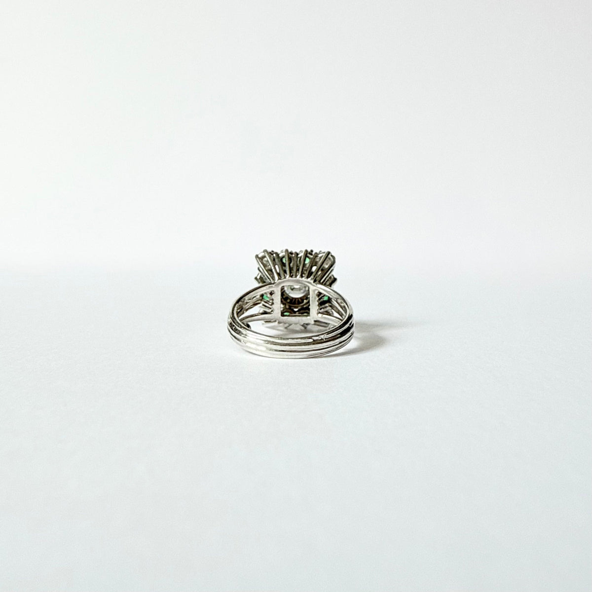 Marguerite Ring in White Gold, Emeralds, and Diamonds