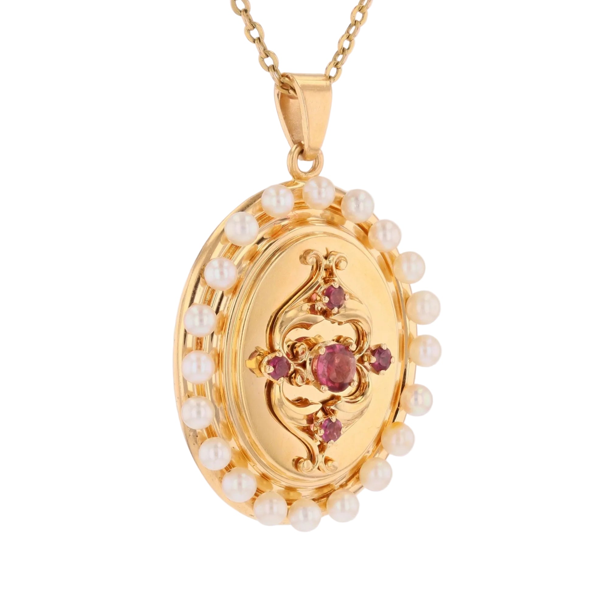 Pendentif en or jaune, perles et grenats