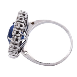 Entourage Ring in white gold, sapphire, and diamonds