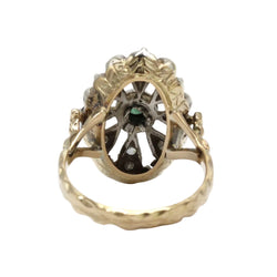 Ring in yellow gold, silver, emerald, and diamonds