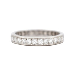 Wedding band ring in white gold and diamonds