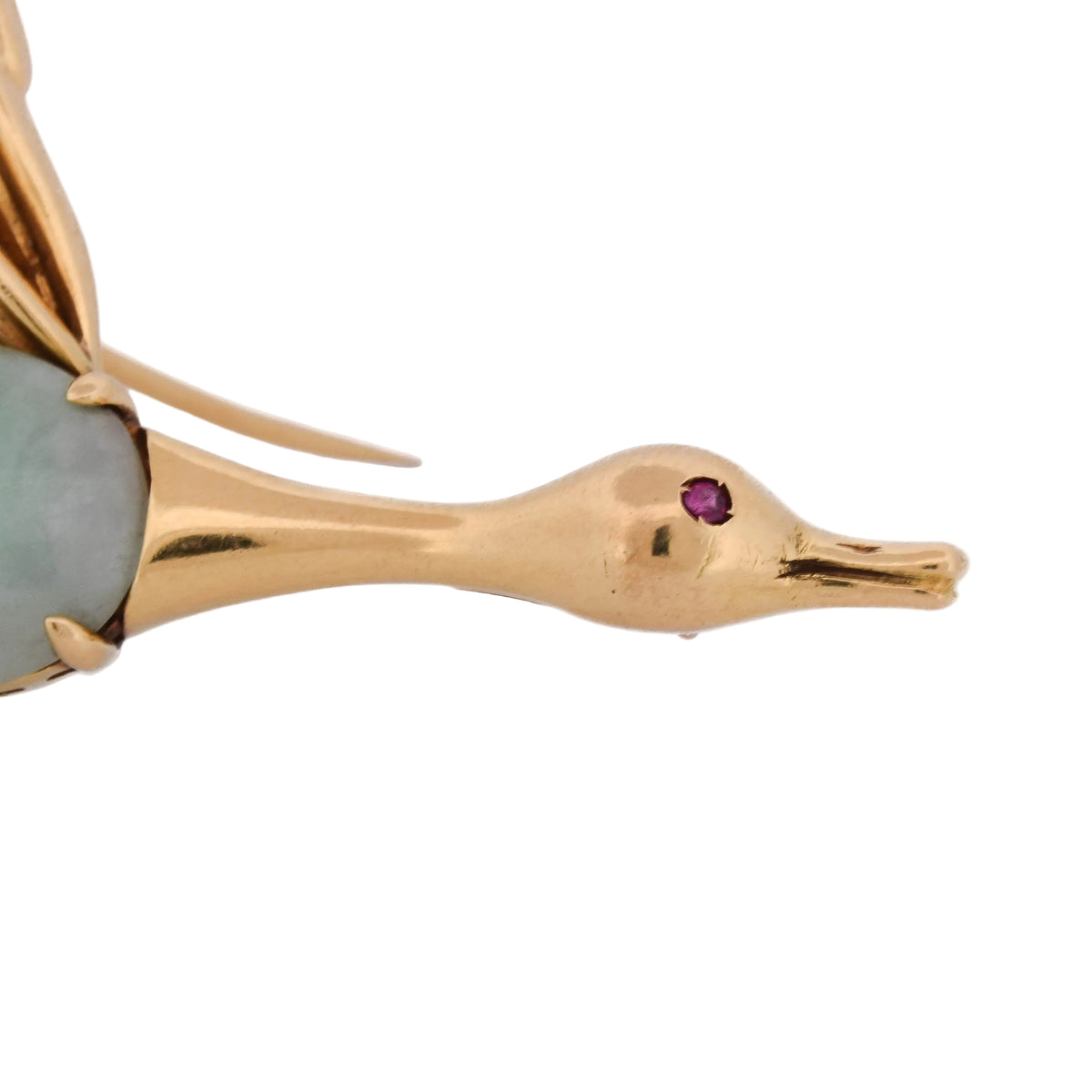 Brooch made of yellow gold, jade, and rubies