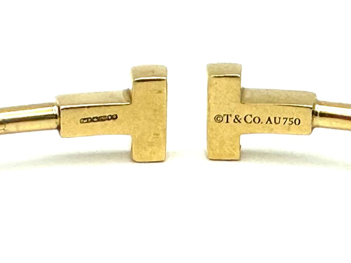 TIFFANY & CO. "Tiffany T" Yellow Gold Bangle Bracelet