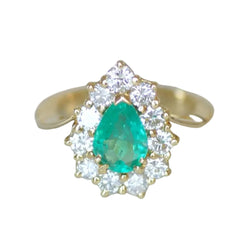 Bague Entourage en or jaune, émeraude et diamants