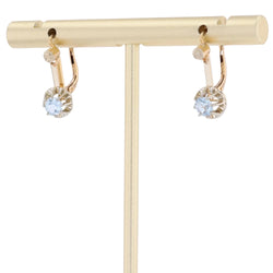 Lever-back earrings in yellow gold, Platinum, and aquamarines