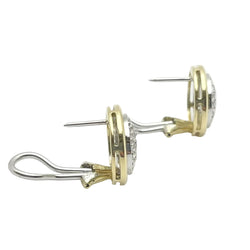 Set in white gold, yellow gold and Diamonds
