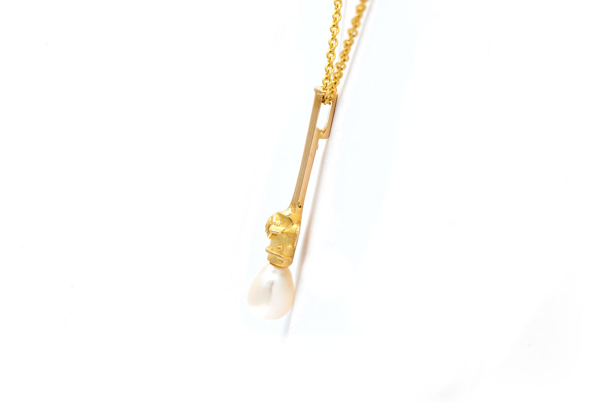 Pendentif en or jaune et perle