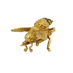 Yellow gold and emerald brooch pin