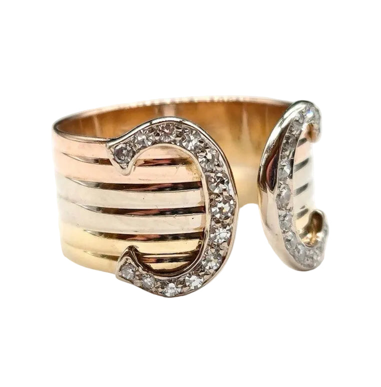 CARTIER "C de Cartier" Band Ring in white gold, yellow gold, rose gold, and diamonds