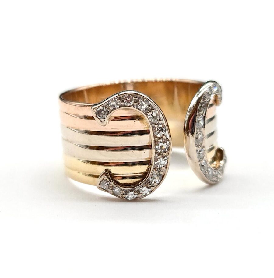 CARTIER "C de Cartier" Band Ring in white gold, yellow gold, rose gold, and diamonds