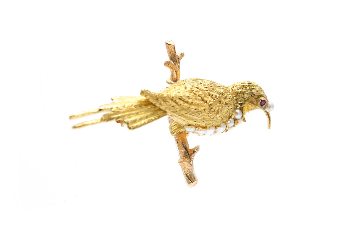 Broche Épingle en or jaune, perles et rubis