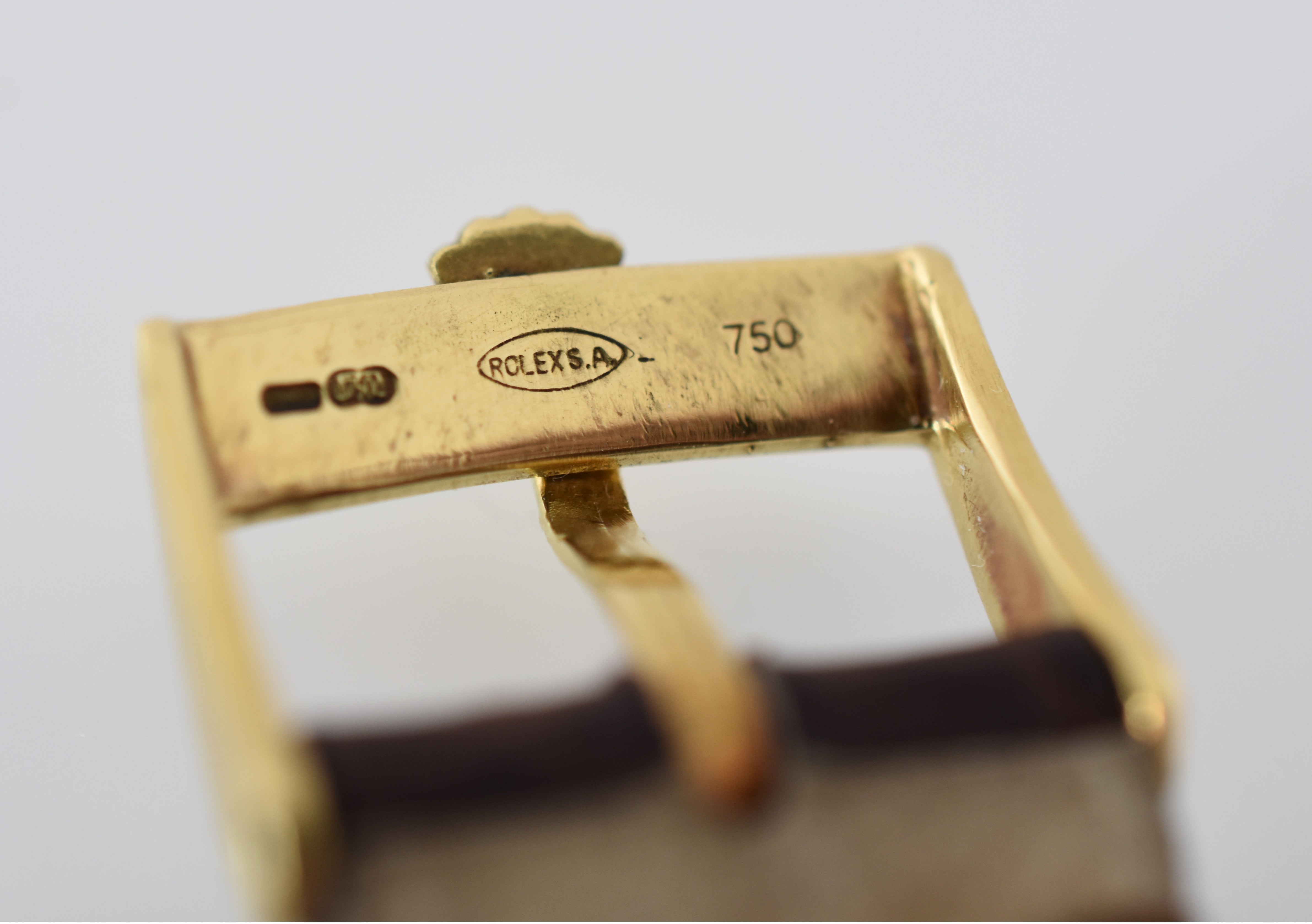 ROLEX "Oyster Perpetual Date Ovettone" watch in yellow gold and leather