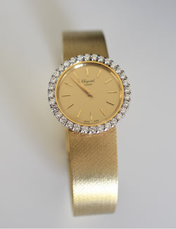 CHOPARD watch, Ref. 810, 18-carat yellow gold and diamonds, solid gold integrated bracelet, circa 1980.