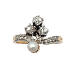 Ring made of rose gold, Platinum, a pearl, and diamonds