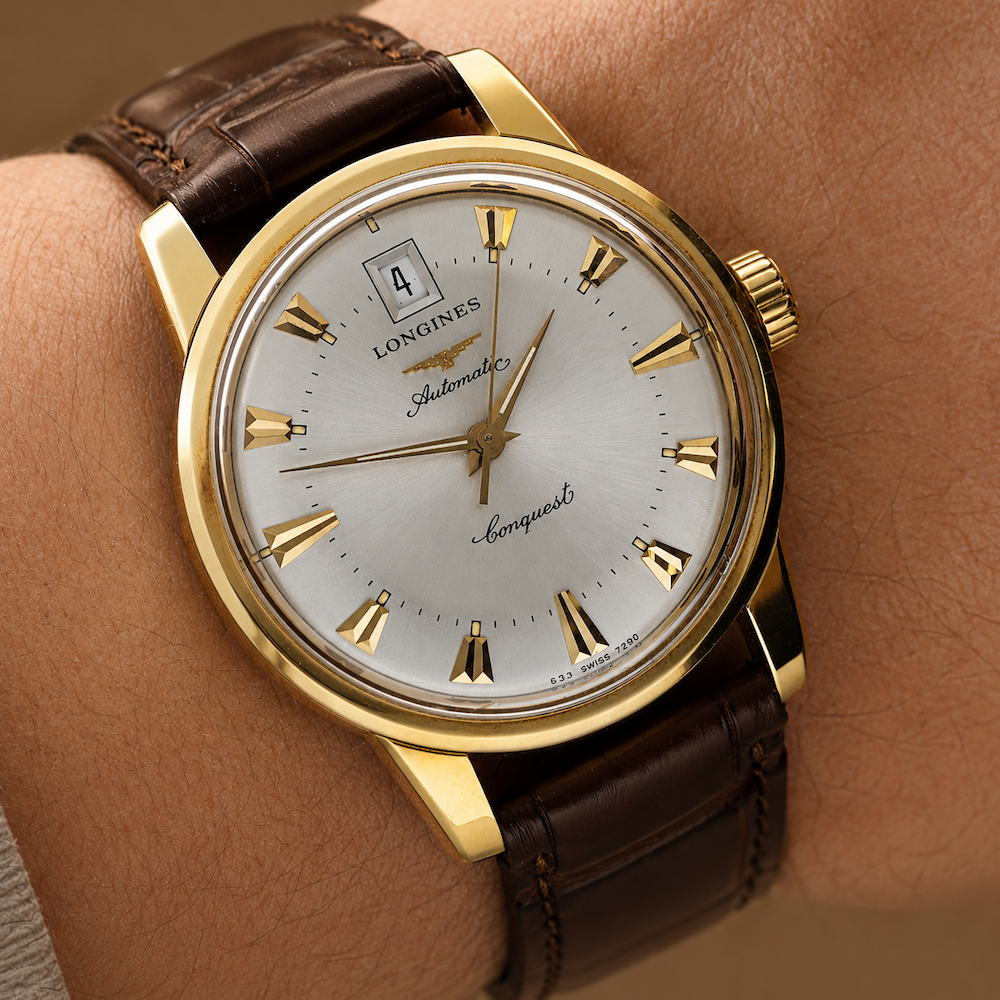LONGINES "Conquest Heritage" Watch in Yellow gold and Leather