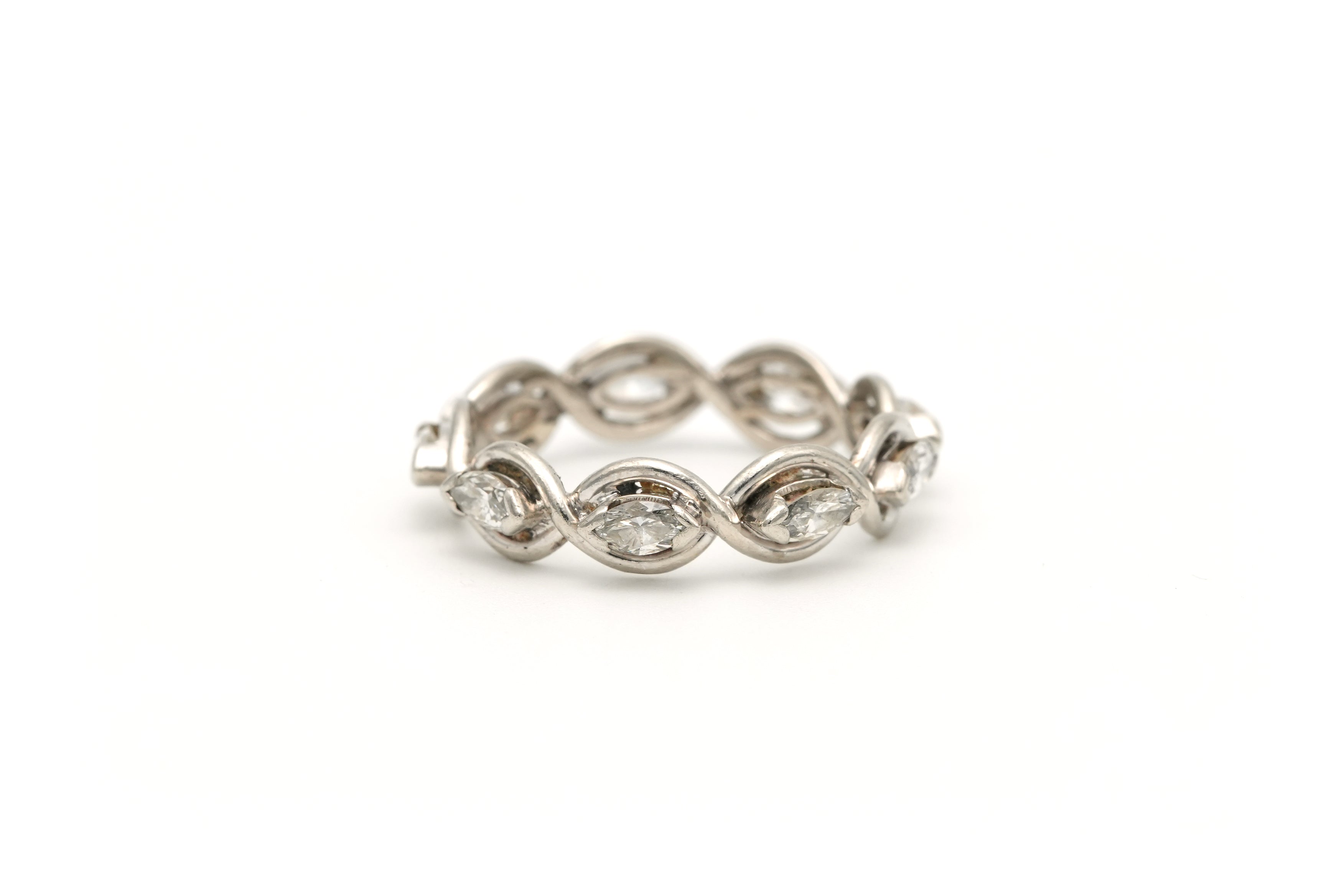 Wedding band ring in white, yellow gold and diamonds