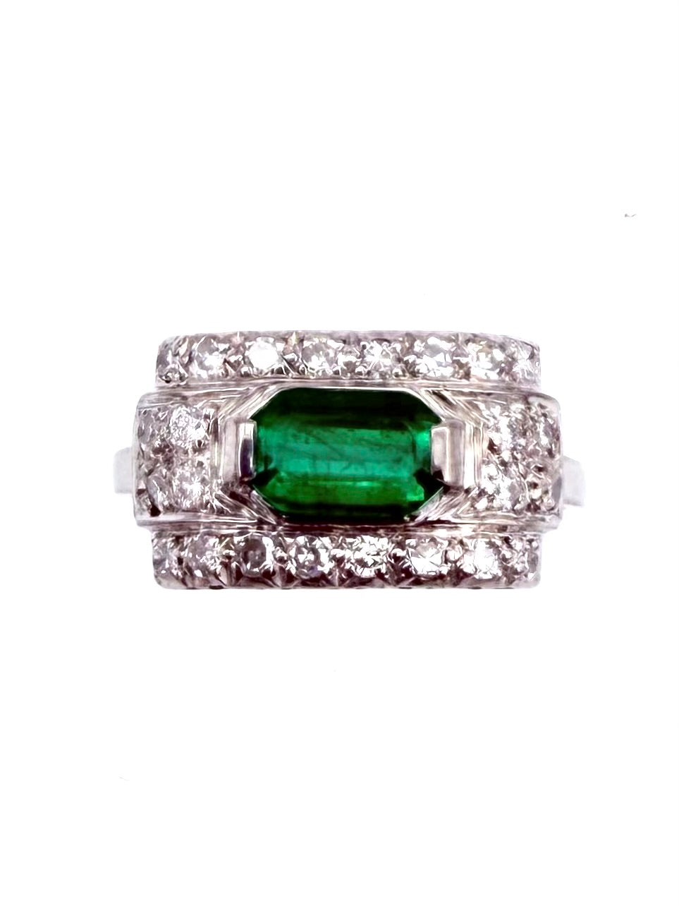 Art Deco ring in gold, platinum, emerald, and diamonds