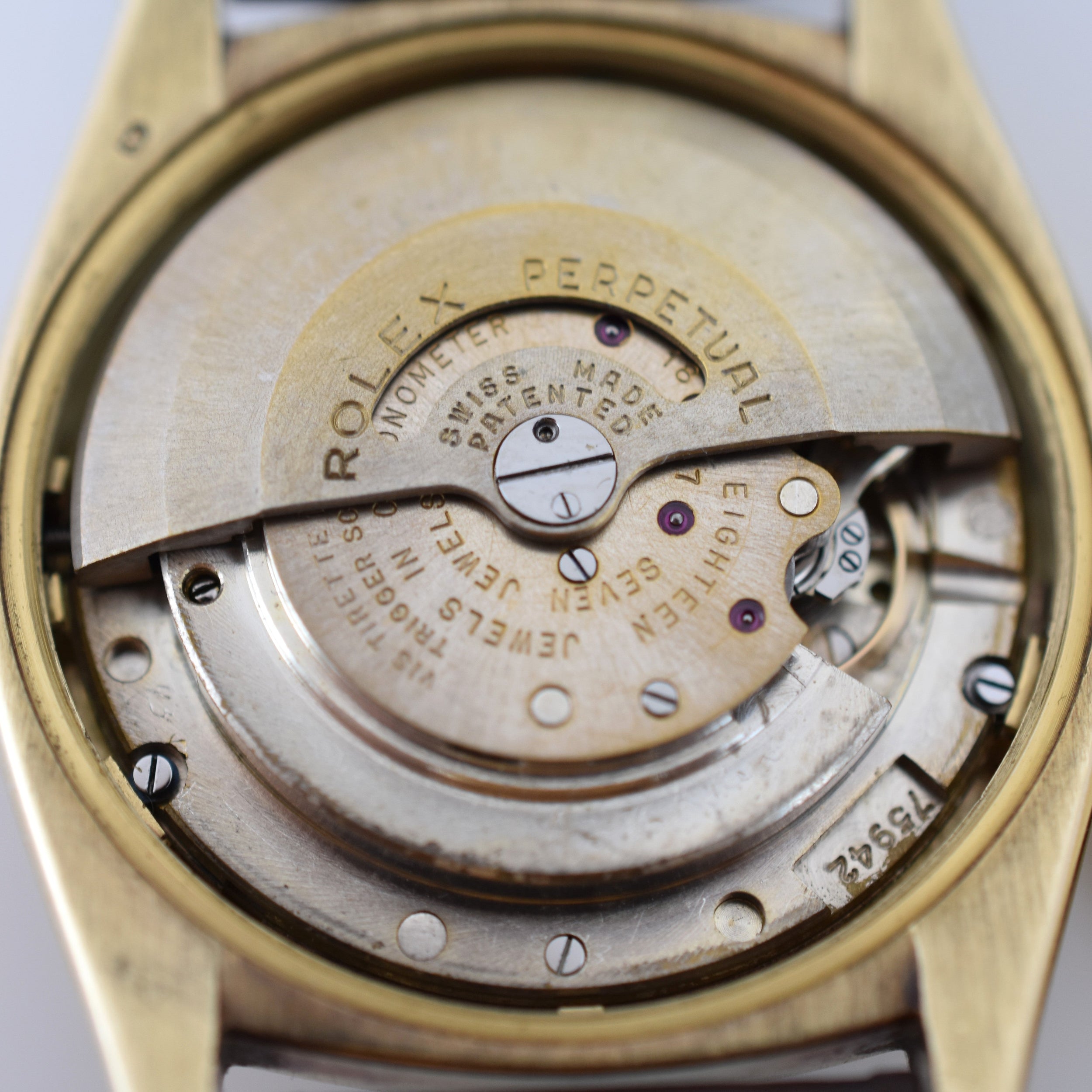 ROLEX "Oyster Perpetual Date Ovettone" watch in yellow gold and leather