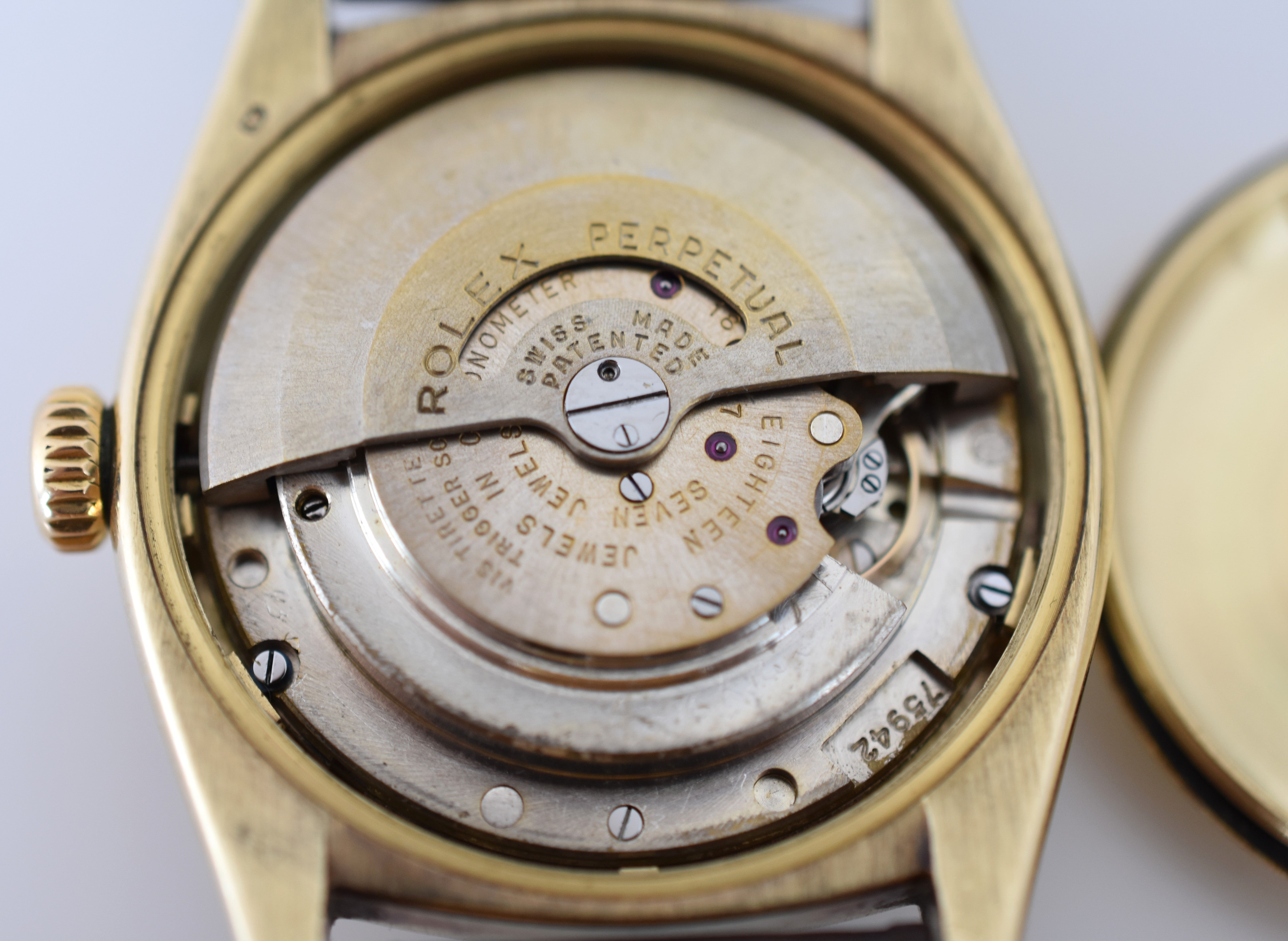 ROLEX "Oyster Perpetual Date Ovettone" watch in yellow gold and leather