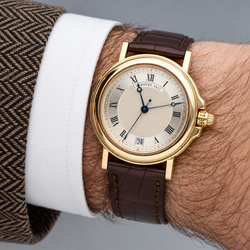 BREGUET watch in yellow gold and leather
