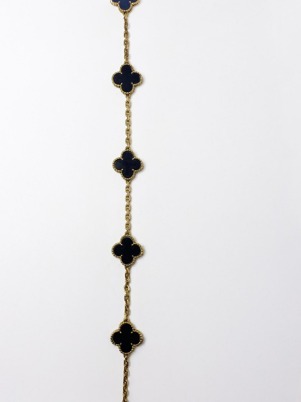 VAN CLEEF & ARPELS "Vintage Alhambra" Long necklace in yellow gold and Onyx