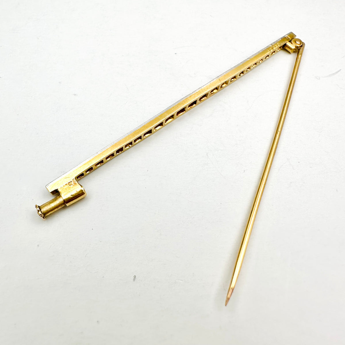 Art Deco Brooch in Yellow Gold, Platinum, and Diamonds