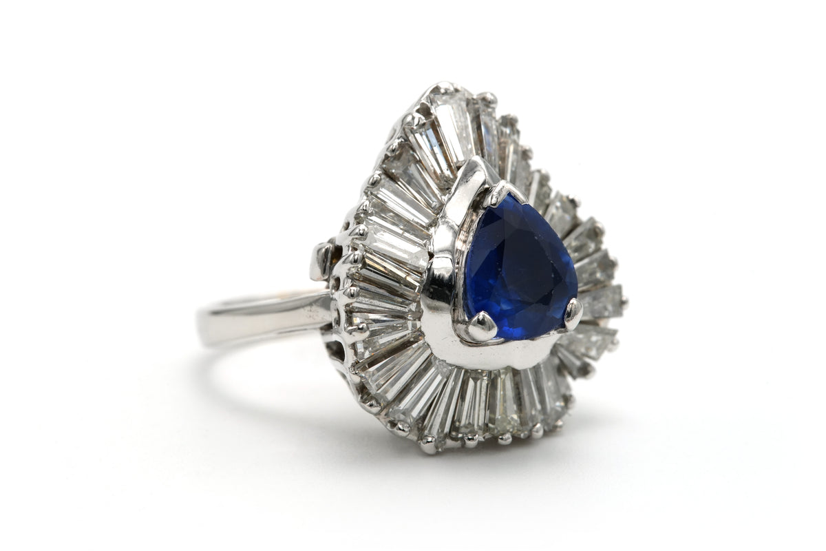 Entourage Ring in White Gold, Sapphire, and Diamonds