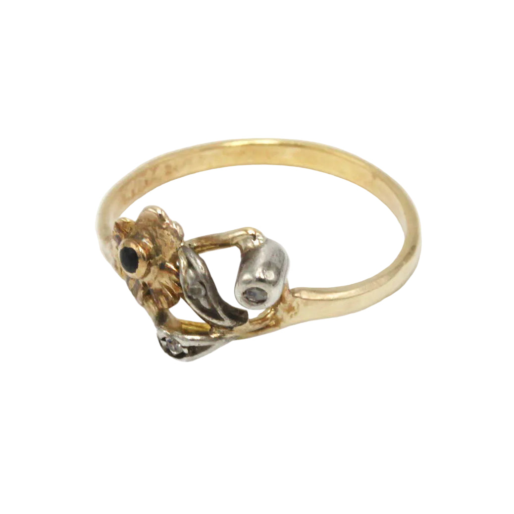 Ring made of yellow gold, silver, black stone, and Diamonds