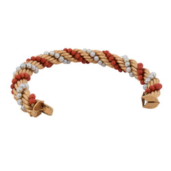 Set of jewelry in yellow gold, coral, and pearls