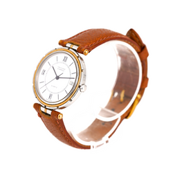 VAN CLEEF & ARPELS "PA 49" GM Watch in yellow gold, stainless steel, and leather