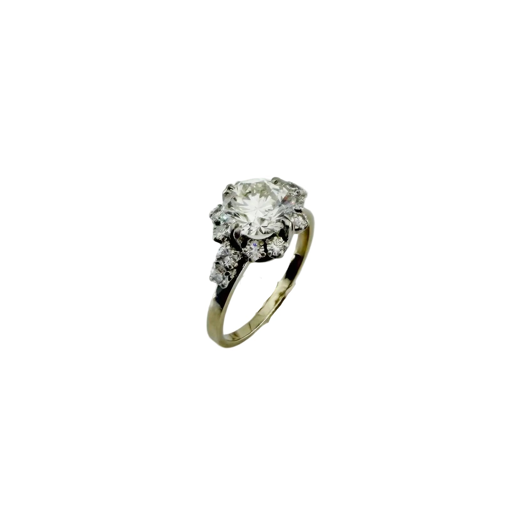 Solitaire Ring in Platinum, White Gold, and Diamonds