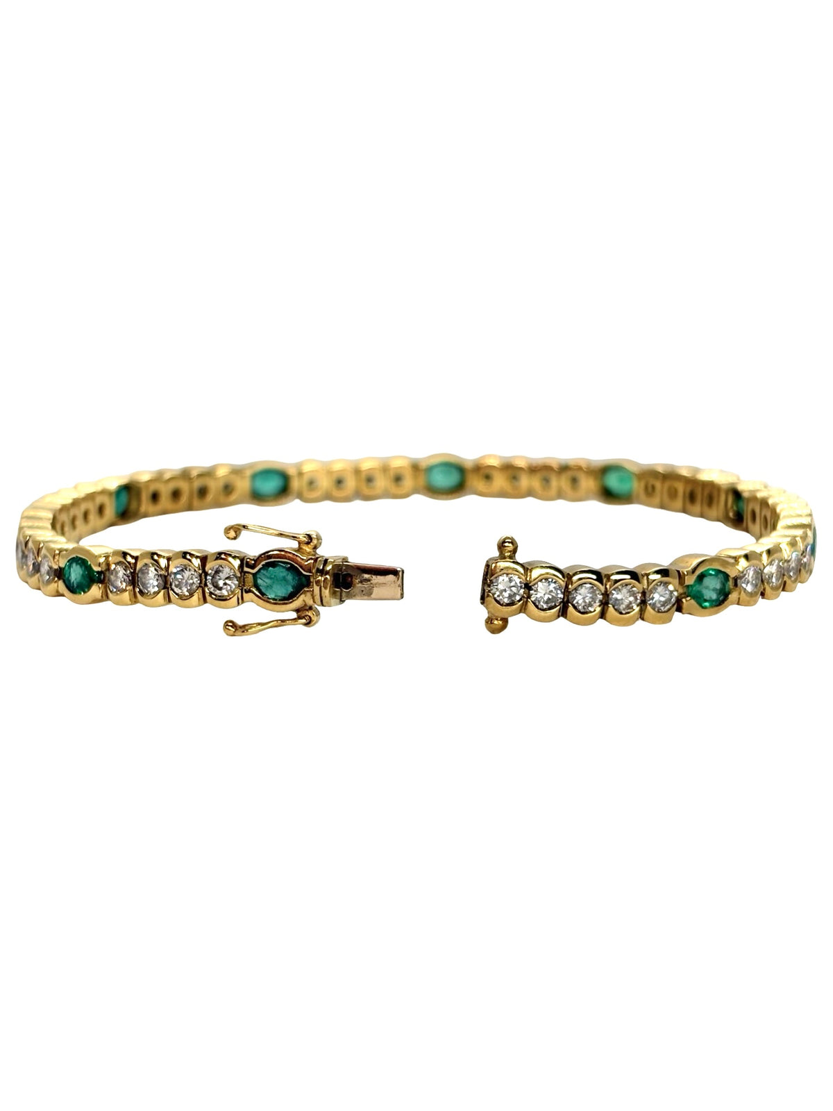"Ligne" Bracelet in Yellow Gold, Emeralds, and Diamonds