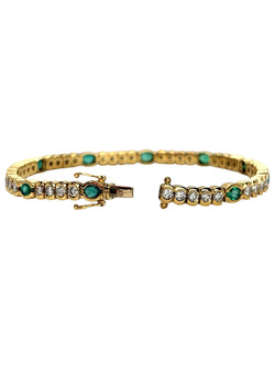 "Ligne" Bracelet in Yellow Gold, Emeralds, and Diamonds