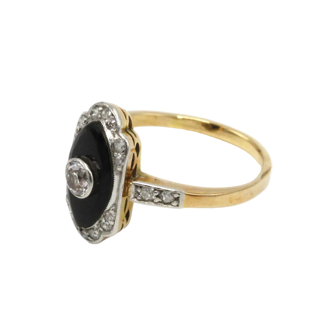 Ring in yellow gold, Platinum, Onyx, and Diamonds